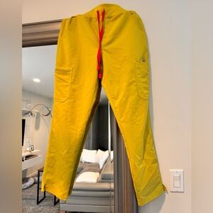 Figs high waisted yola scrub pant in color limeade